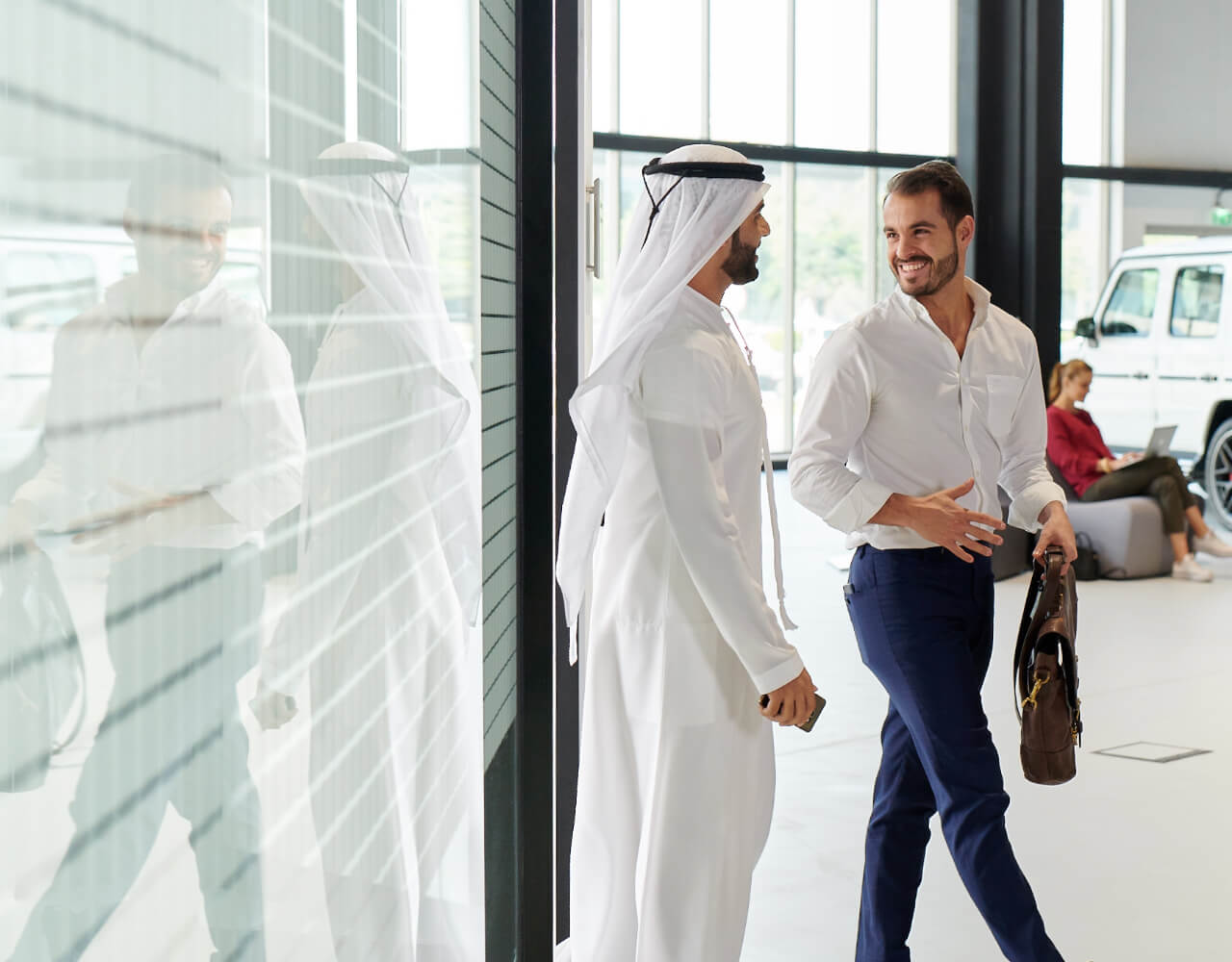  Two men happily entering one of our light industrial units in Dubai